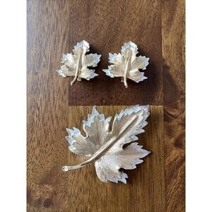 Pair Of Gold/Silver Tone Maple Leaf ClipOn Earrings And Matching Lapel Pin